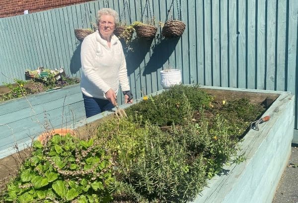 Ivy Court Care Home resident having fun at the Gardening Club