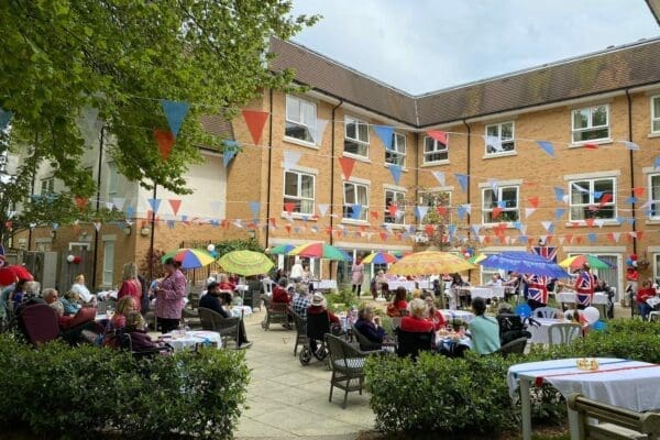 Celebrating the coronation at Aria Care communities!