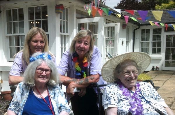 Residents, family and the team at Rectory House Care Home enjoying their garden party during Care Home Open Week 2023