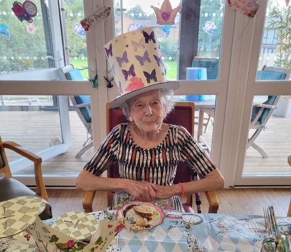 Rendlesham Care Home residents having fun at the Mad Hatters Tea Party for Afternoon Tea Week August 2023