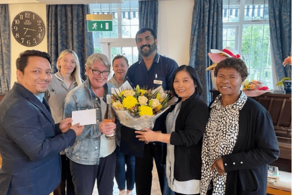 Lesley, pictured third from left, celebrated her 25th anniversary of working at Coxhill Manor with her colleagues and the people she cares for.
