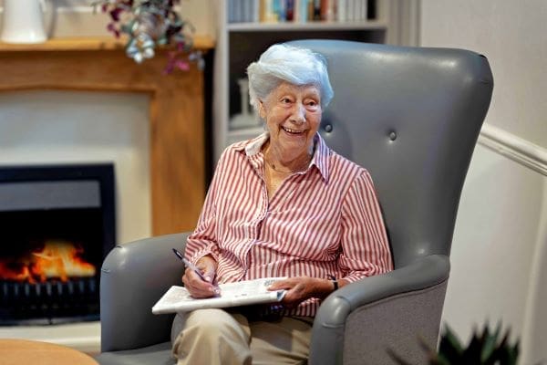 Resident doing a crossword