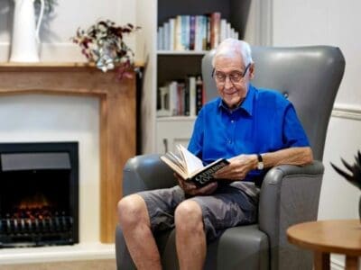 Resident reading a book