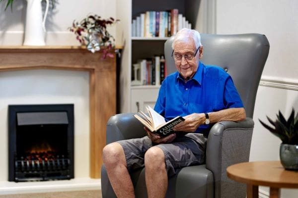 Resident reading a book