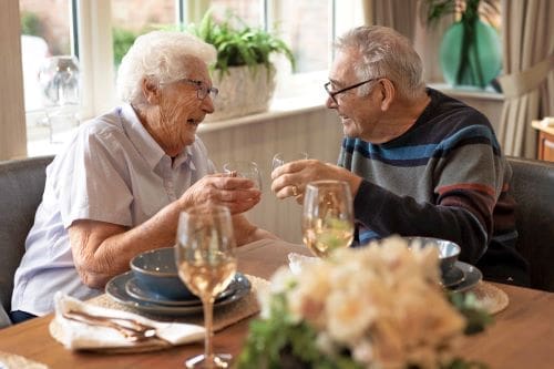 Residents enjoying a drink in private dining