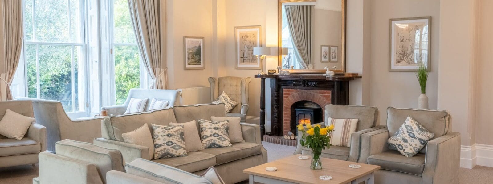 Walstead Place Care Home, newly refurbished lounge with original fireplace in November 2023