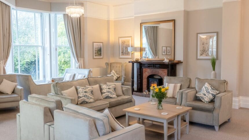 Walstead Place Care Home, newly refurbished lounge with original fireplace in November 2023