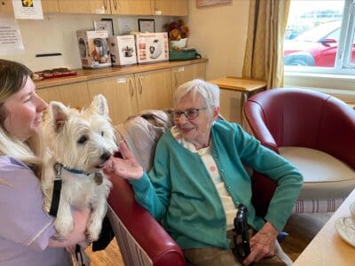 Mount Pleasant resident enjoys canine company at the Doggy Cafe