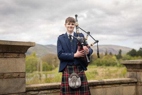 Charlie performs bagpipes for Beechwood Park residents