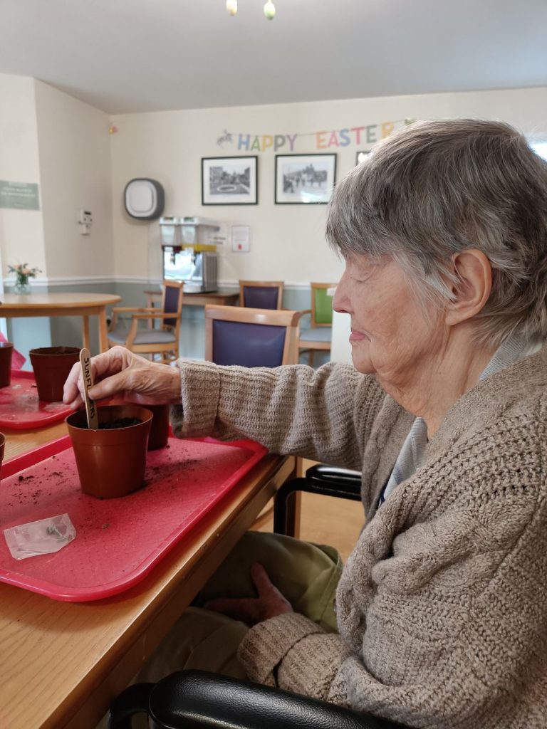 Holmwood resident sowing seeds